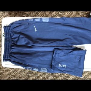 Nike sweatpants and running shorts